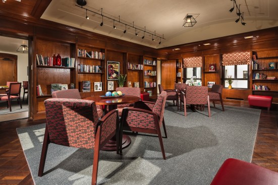 The new development includes a library as well as a computer room, a game room, a gallery, a barbecue area, community gardens, a rooftop lounge, and program space for social services.
