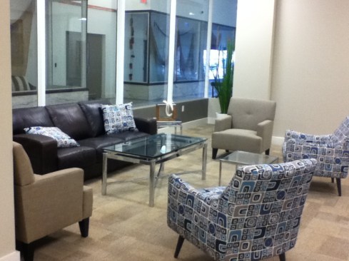 The development features 14 one-, 24 two-, and six three-bedroom apartments. All units include Energy Star appliances, self-controlled energy-efficient heating, and central air-conditioning. Common amenities include a laundry, storage space, a community room, an exercise room, a computer room, and 58 parking spaces in the heated underground garage.