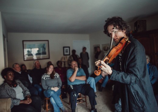 Violinist Tim Fain, best known for his performance in the movie "Black Swan," performed in renter Tom Wall's home as part of Make Room's "Concerts for the First" series.
