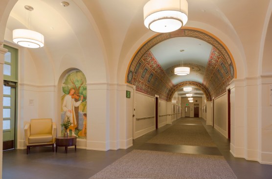 The development team completed the adaptive reuse of the building, originally constructed in 1924 in the Spanish Colonial Revival style. 55 Laguna was most recently known as Richardson Hall at the former University of California at Berkeley Extension campus. Fresco murals in the corridors that had been coated by paint by previous building operators were uncovered. 