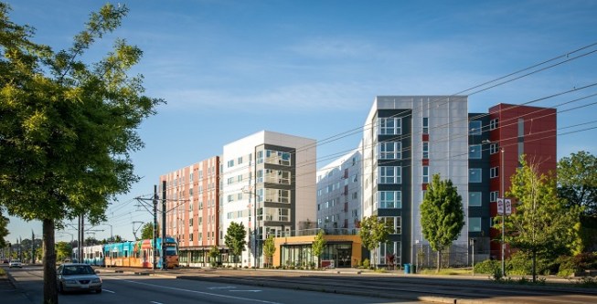The transit-oriented development is built on surplus land that the regional transit provider had acquired when assembling property for a light-rail line. 