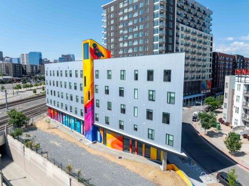 Pennrose, Rivet Development Partners, and TGTHR recently celebrated the opening of Nest56 at Denargo Market, a supportive housing development for transition-age youth at risk of homelessness in Denver.