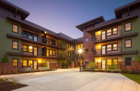 The development features 40 one-bedroom and 17 two-bedroom units for households earning at or less than 50% of the area median income (AMI). Eight of the units have project-based Department of Housing and Urban Development Sec. 8 vouchers and are targeted to households earning 30% or less of the AMI.