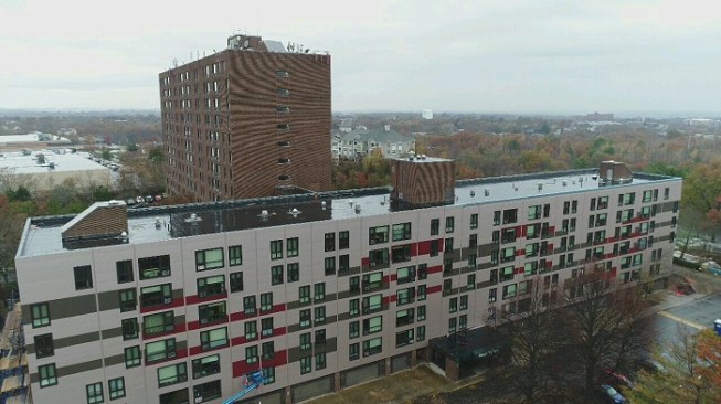 The 250-unit development features a mix of one-, two-, and three-bedroom apartments. 
