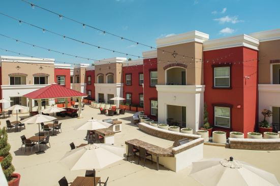 Amenities were designed for active seniors to enjoy. While a full, indoor demonstration kitchen and outdoor barbecues were incorporated into the community for cooking, a gazebo, and a canvas-covered picnic area provide a place for residents to relax.