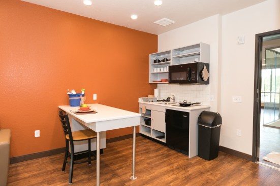The units are outfitted with plates, pots and pans, towels, sheets, a starter food kit, and a gift card to a grocery store to help residents get settled in their new homes.