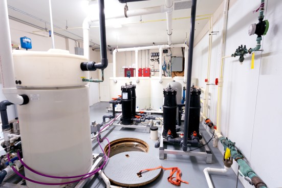 The project incorporates a greywater recycling system that captures water used during showers and baths and then filters it through a system that pumps clean water back to the units for toilet flushing. 