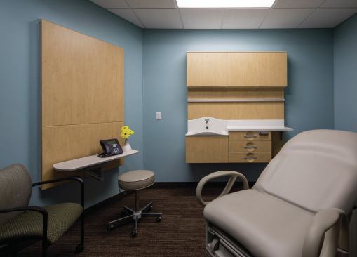 The health and wellness center includes rooms for specialized therapies and space for nurses.