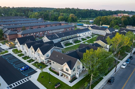 Northside Village, the first phase of the Yates Village public housing redevelopment in Schenectady, New York, substantially rehabilitates 25 existing apartments and provides 64 new homes.