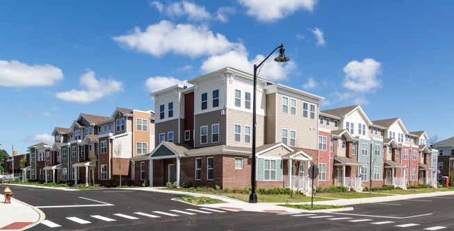 The transit-oriented development received LEED Silver certification. The development team also acquired off-site parcels to create a safe walkable path to the nearby New Jersey Transit and Amtrak station.