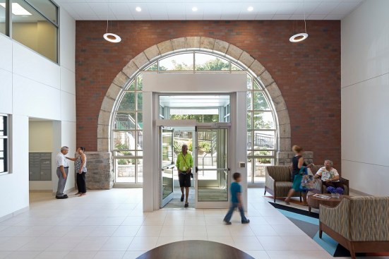 Schoolhouse Terrace is built on the site of the old Public School 6 in Yonkers, N.Y. The vacant school had to be demolished, but developers preserved its distinctive archway, integrating it into the entry of the senior building,