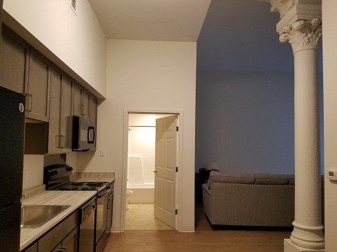The redevelopment preserves many beautiful and distinctive features of the building, including the Victorian Gothic façade as well as interior features such as marble fireplaces and Corinthian columns.