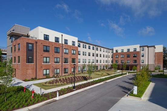 The $15.8 million development replaces a former brownfield with a LEED Gold building that utilizes solar panels to power the common areas and reduce utility costs to operations by more than 60%. 