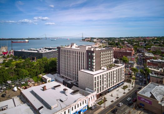 The Pearl is a 100% affordable housing development on New York's Staten Island. Developed by BFC Partners, the building features 270 units, half reserved for formerly unhoused older adults.