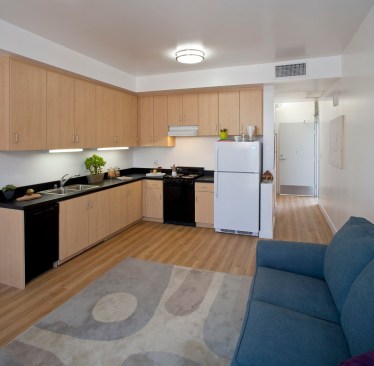 The Six feature 45 studios and seven one-bedroom units. Twenty-one units are restricted at 30% of the area median income (AMI), 18 units are restricted at 45% of the AMI, and 11 units are restricted at 50% of the AMI.  The development is covered by project-based Sec. 8 vouchers. Two units are reserved for property managers.