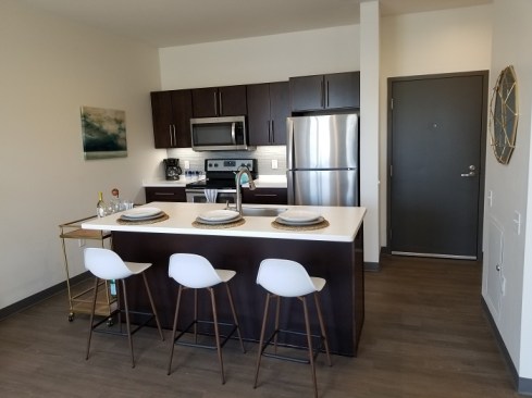 The $23.4 million development has  42 one-bedroom and 12 two-bedroom apartments. Forty-three of the 54 units are for residents earning no more than 25%, 50%, and 60% of the area median income, including 13 supportive housing units for veterans.