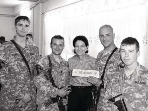 Sen. Snowe meets with Mainers on a trip to Iraq in 2007.