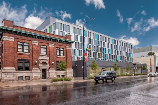 Developed by Heartland Housing and Center on Halstead, Town Hall Apartments in Chicago is one of the first affordable housing communities built with lesbian, gay, bisexual, and transgender seniors in mind. The 79-unit development combines new construction with the reuse of a historic police station.