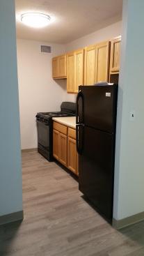An apartment at Colt Arms has been renovated with a new kitchen. Hudson Valley Property Group is investing $12 million into the building. In addition to new kitchens, apartments are receiving new bathrooms and floors.