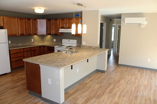 Village Centre features 21 one-bedroom, 17 two-bedroom, and 10 three-bedroom units.