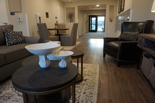 Wheatland Crossing Senior Apartments includes a multipurpose community room, on-site management office, a wellness room for health professional visits, and laundry facilities. There is also an outdoor sitting area and a bocce ball court.