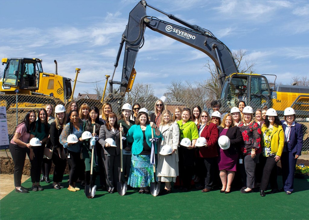 Women who work at Woda Cooper Cos. celebrate the start of construction of Lockbourne Greene in Columbus, Ohio.