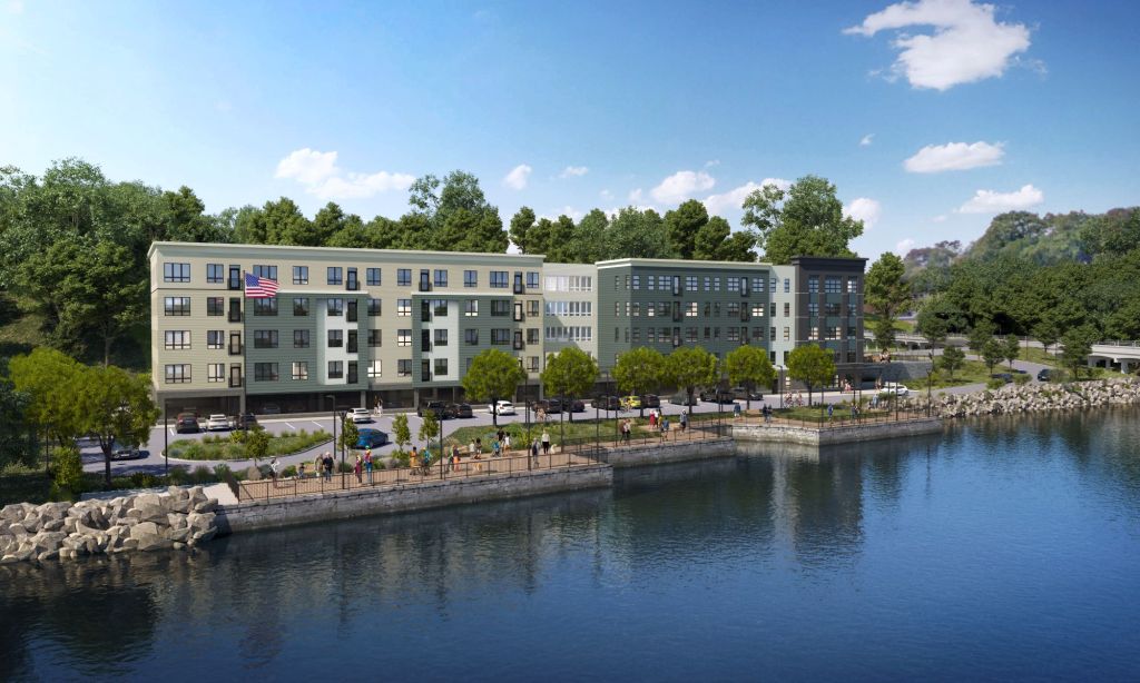 The Eastwalk is projected to be ready for occupancy in July 2026. Amenities will include a community room with kitchen, a workspace for residents, a fitness room, an interior bike storage room, and an on-site management/leasing office.