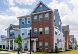Imani Village Phase II in Wilmington, DE includes 67 new townhomes across five buildings, part of an eight-phase redevelopment to replace aging public housing with 713 high-quality, mixed-income homes. Cinnaire supported Imani Village through an investment of Low-Income Housing Tax Credits.
