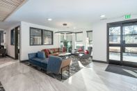 Amenities at The View at NoDA include a clubhouse, a business center, a fitness center, bicycle storage, and community access systems.