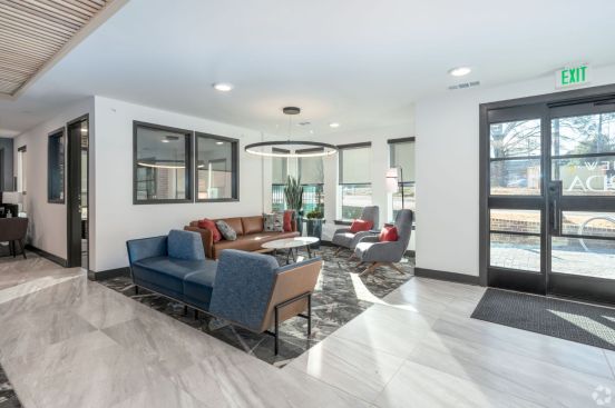 Amenities at The View at NoDA include a clubhouse, a business center, a fitness center, bicycle storage, and community access systems.